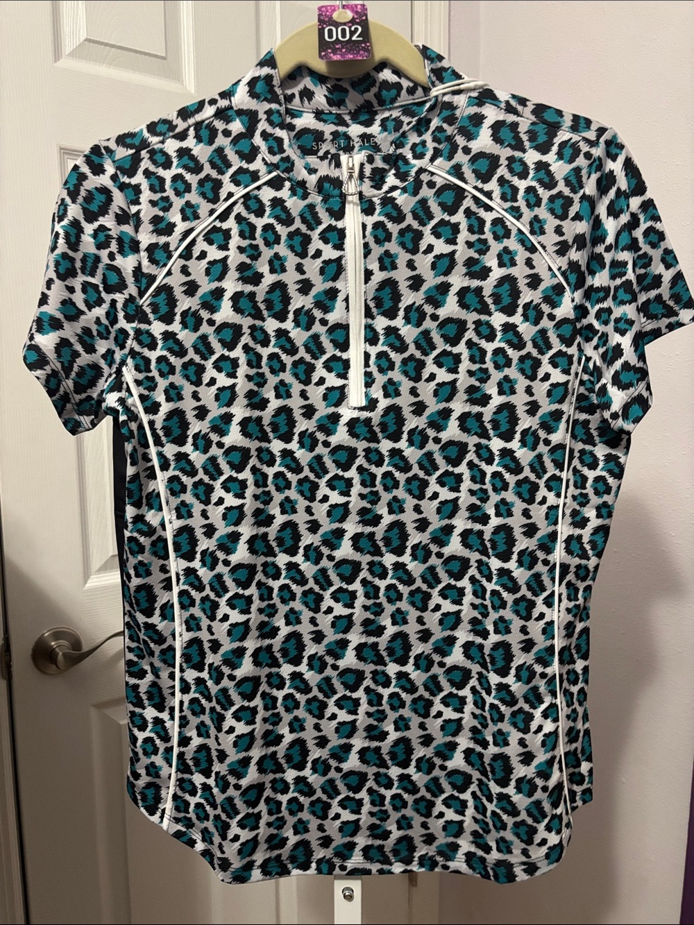 #002 Sport Haley Teal Black White Leopard Zip Short Sleeve Top